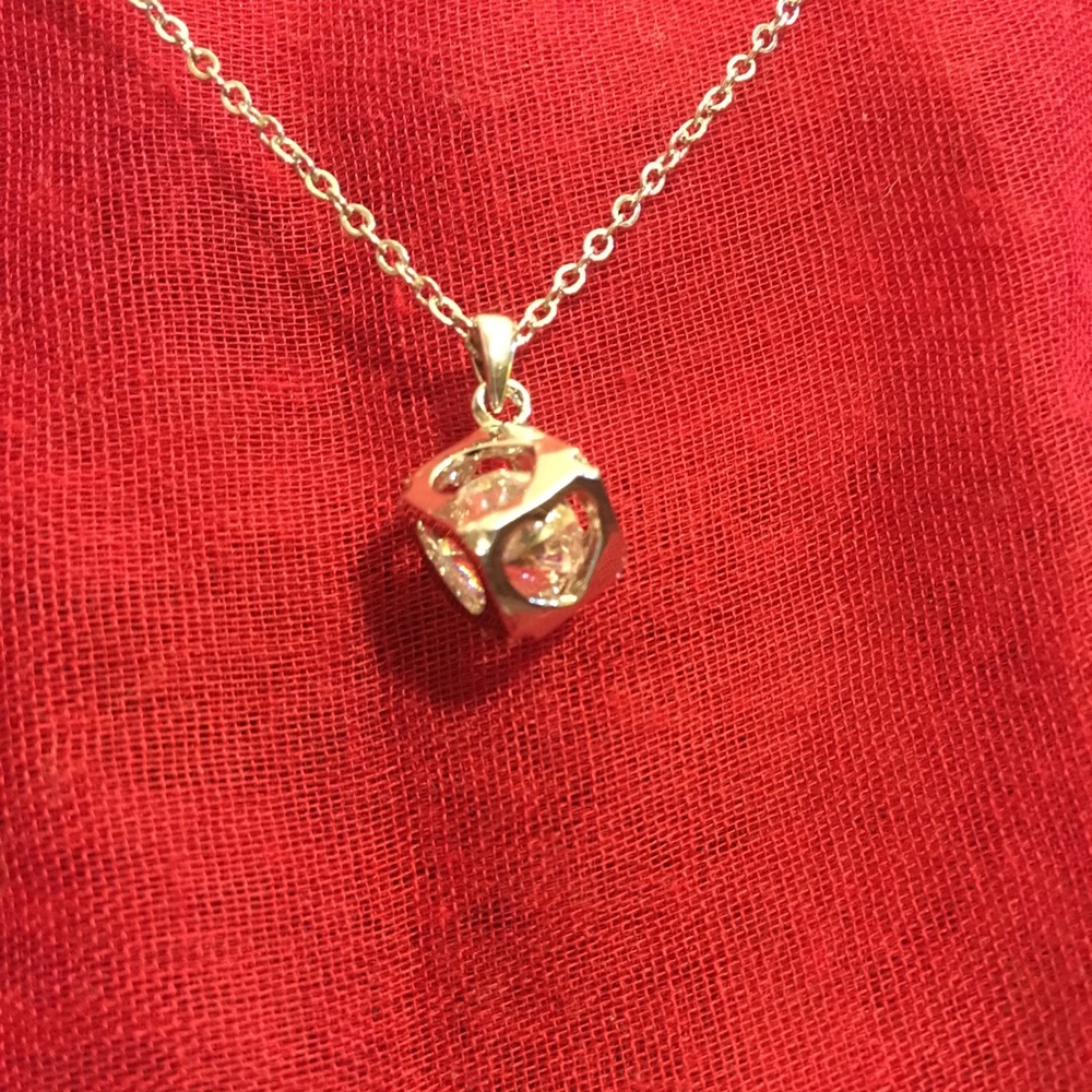 Captured diamond heart necklace
