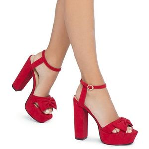 Red Shoe Dazzle heels.