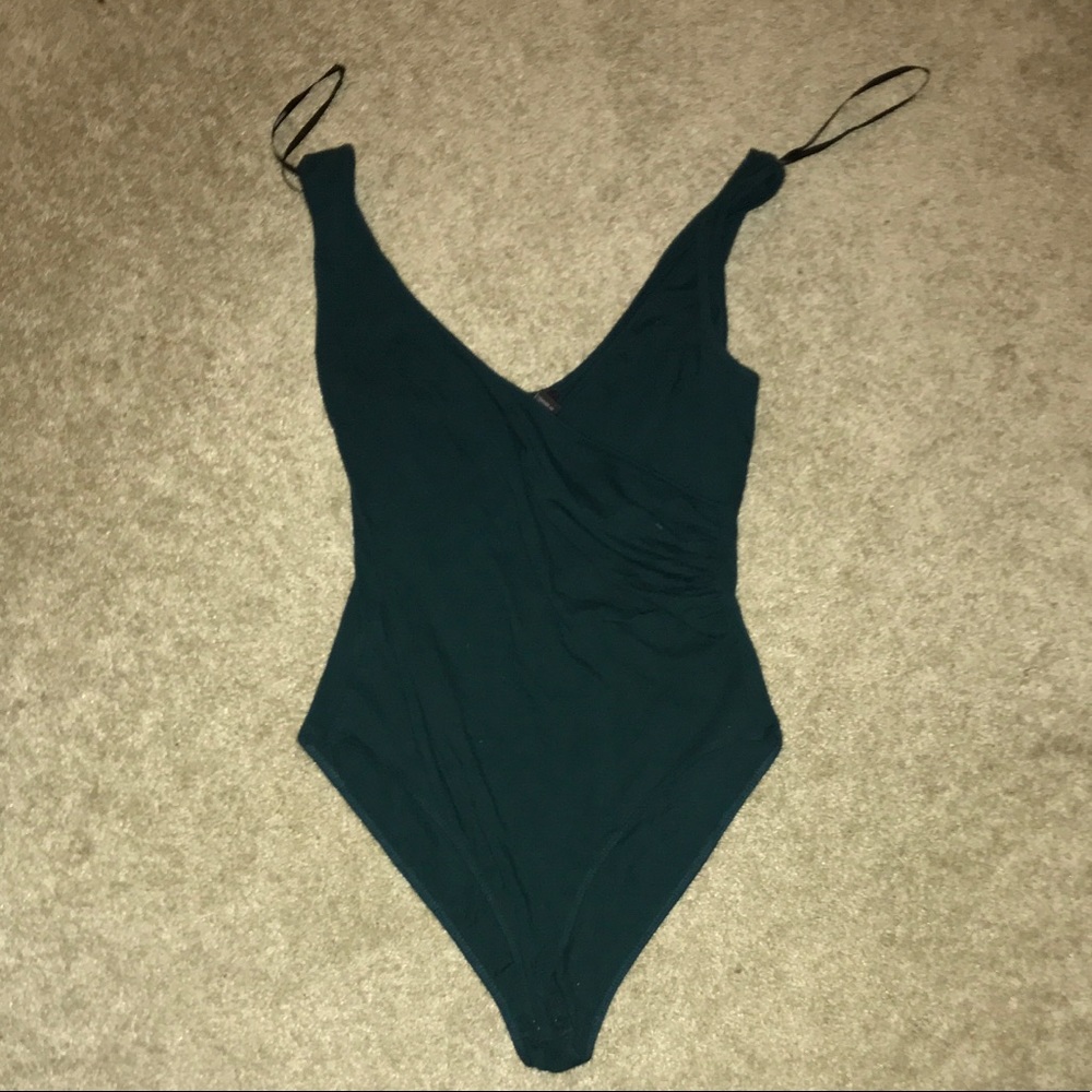 Green crisscross sleeveless bodysuit