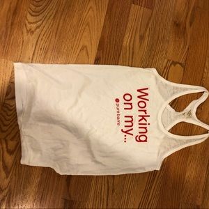 Worn once. Pure Barre “Working on my ledge” tank