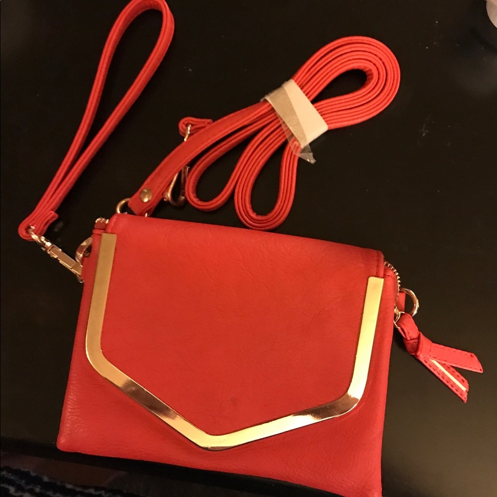 NWOT Adorable red cross body purse.