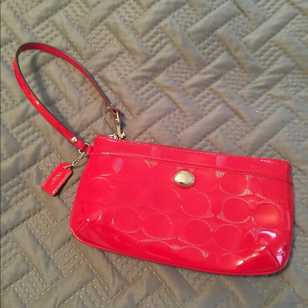 Red patent leather Coach clutch wrist let.