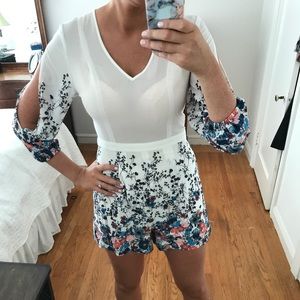 White V neck Romper with floral detail