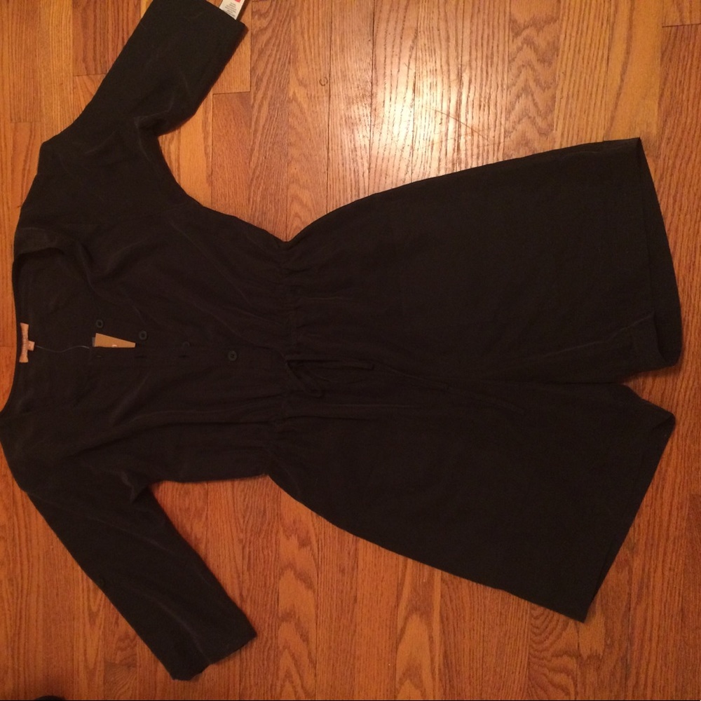 A black button up jumper