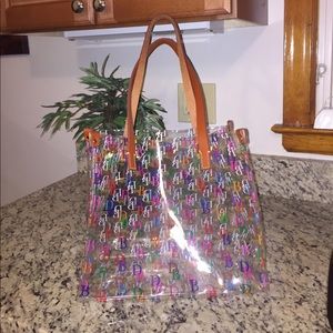 Clear Dooney & Bourke tote bag w/leather straps Clear Dooney & Bourke tote bag w/leather straps