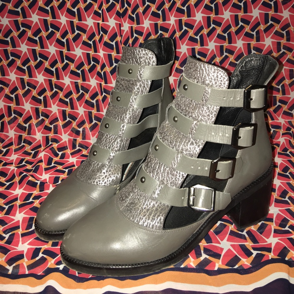 Unique multiple buckle, cut out boot