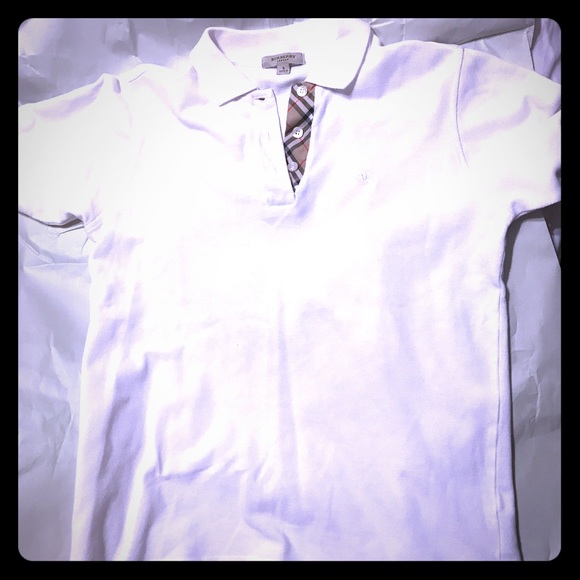Burberry Tops - Burberry white polo selling for $45 on e.bay