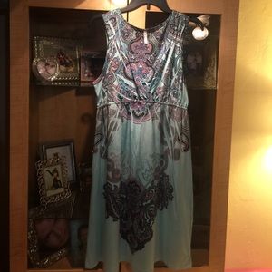 Kiara Aqua with intricate patterned dress