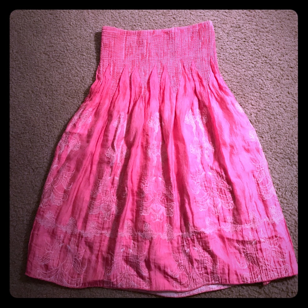 Pink OS dress or bathing suit cover.
