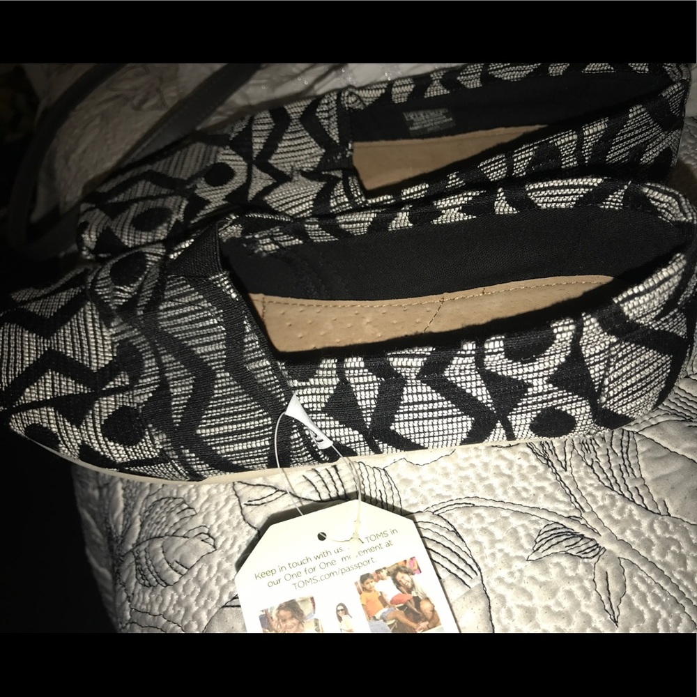 Brand New Toms never worn!