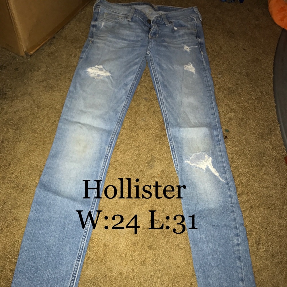Hollister distressed skinny jeans .