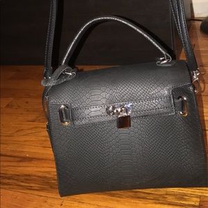 Black handbag by icing