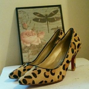 Never Worn red sole faux pony hair pumps Never Worn red sole faux pony hair pumps