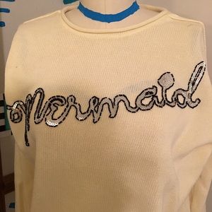 Cream colored Wildfox long sleeve sweater. Cream colored Wildfox long sleeve sweater.