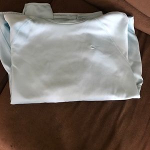 Nike Therma Fit hoodie baby blue in color