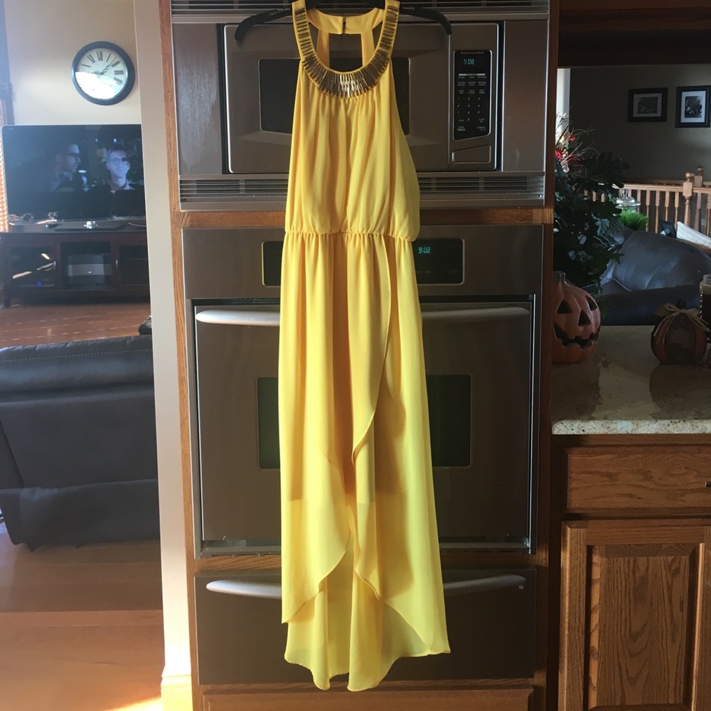 Bright yellow high low dress
