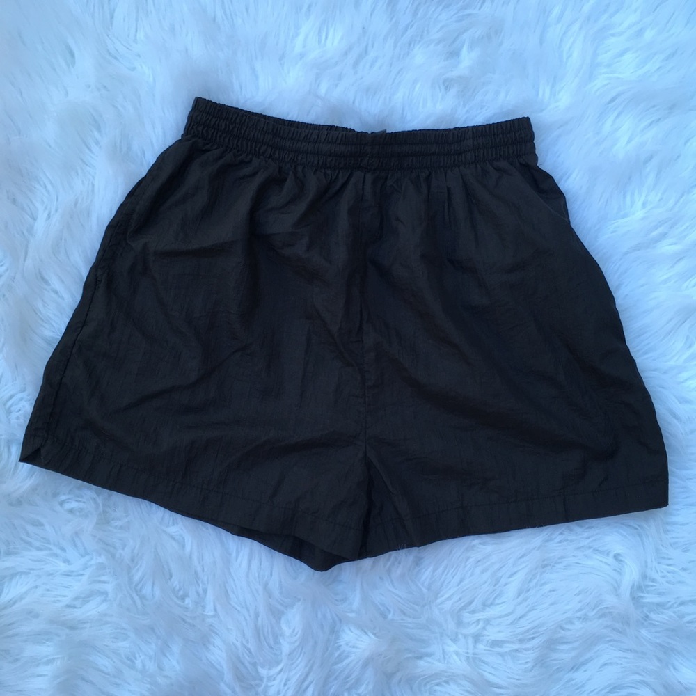The body co black swish shorts