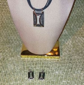 Silver tone necklace with black threads earrings