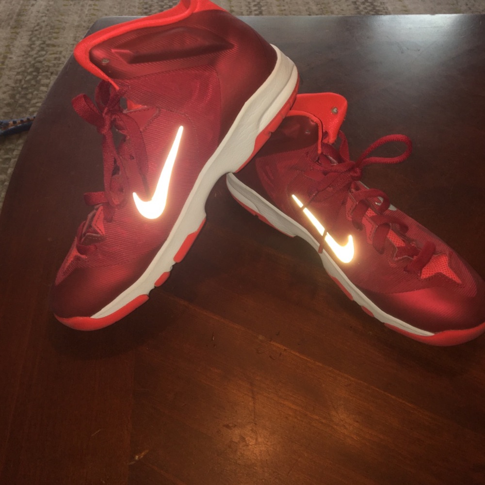 Red Nike basketball shoes