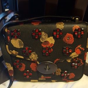 Auth coach floral jewel page