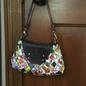 Nahui Ollin Mini Peace and Love handbag.