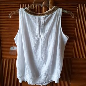 White no sleeve blouse