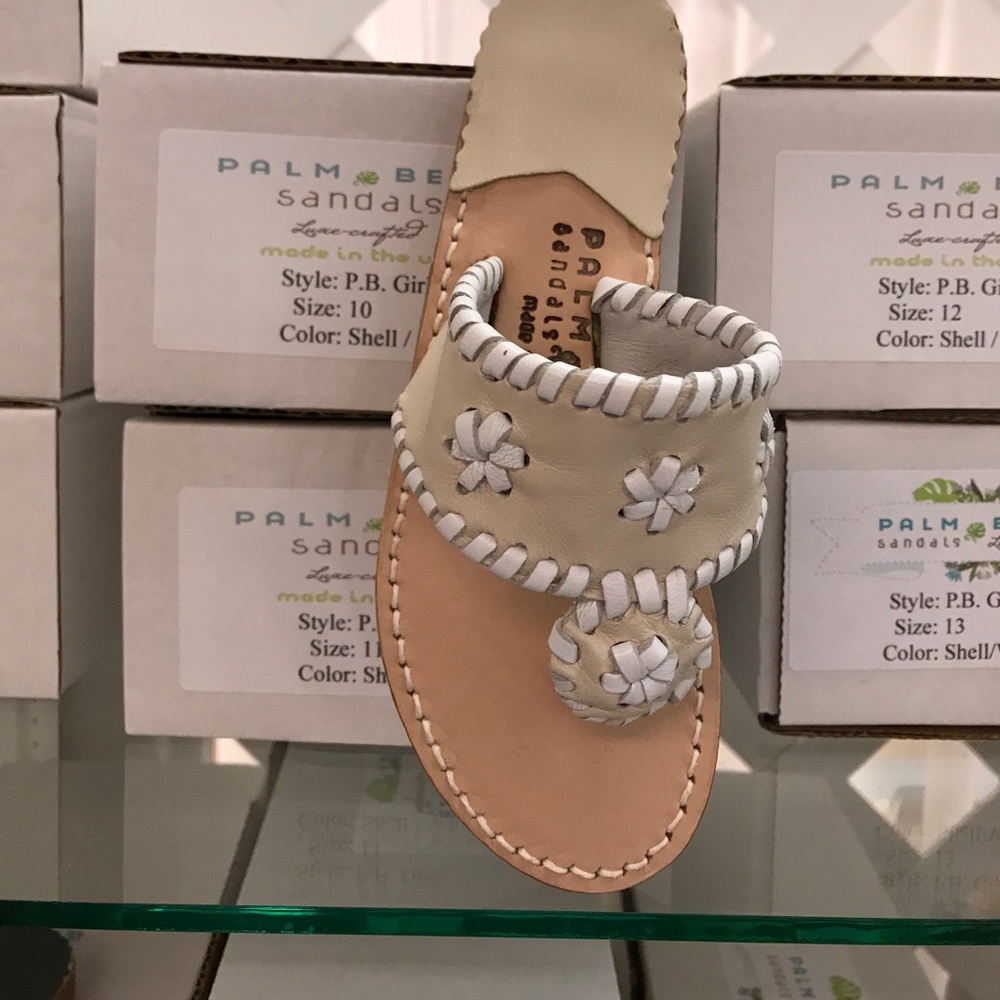 Tan and white palm beach sandals