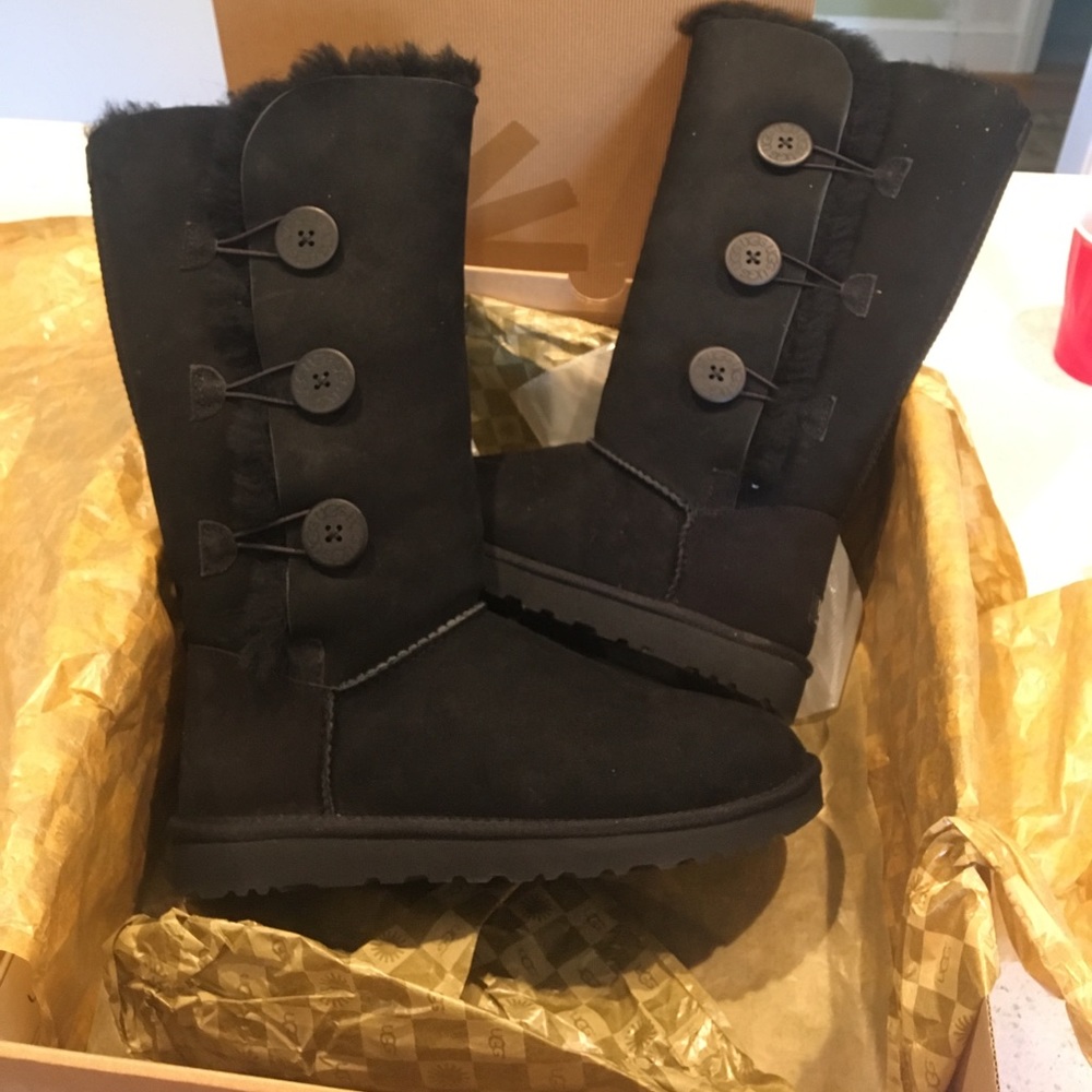 Black tall three button uggs