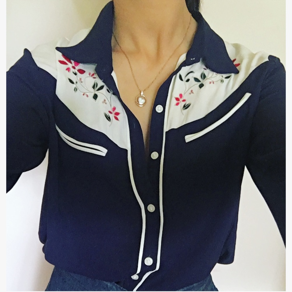 Embroidered blue and white blouse