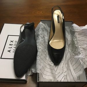 Alex Marie black sling back pumps.