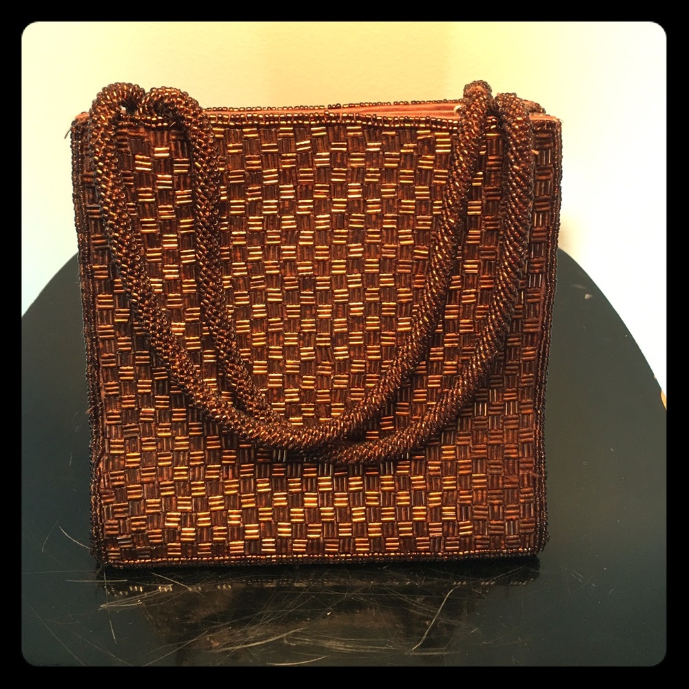 Adorable bronze beaded evening bag.