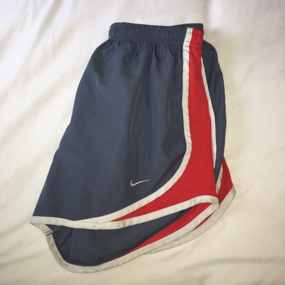 Nike shorts, generously worn