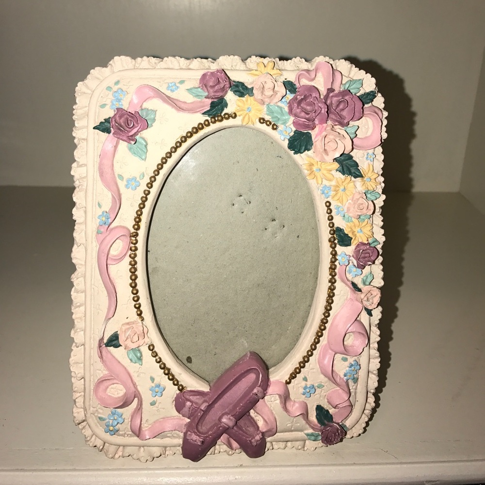 Picture frame with ballet slippers and flowers
