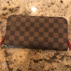 Authentic Louis Vuitton Insolite wallet.