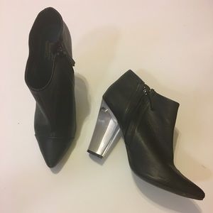 Black ankle boot with lucite heel