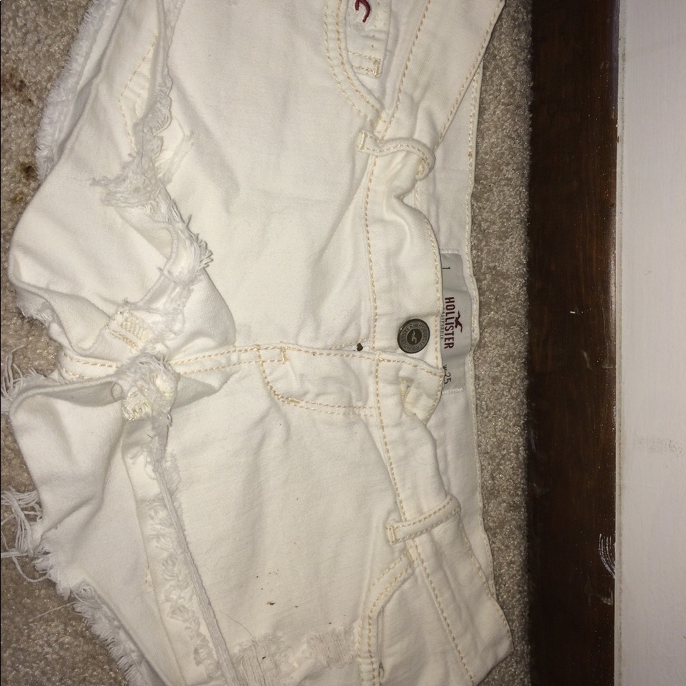 White distressed shorts