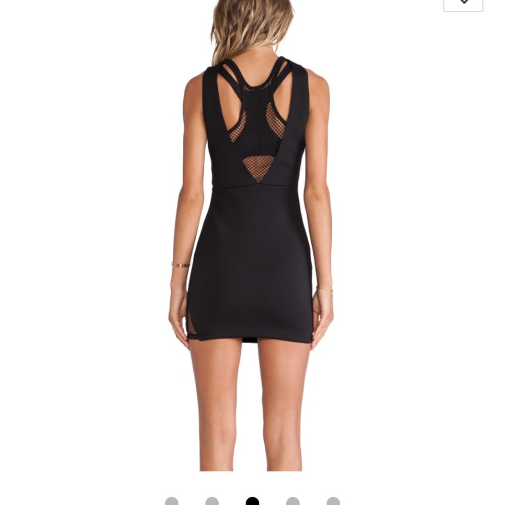 Never been worn black Asilio dress.