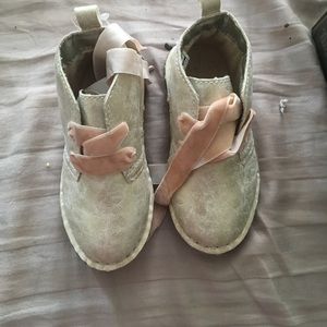 A gold carter toddlers shoe