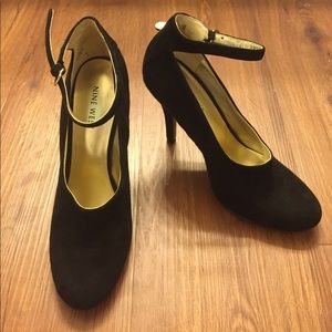 Black suede high heel shoes