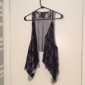 Grey sleeveless cardigan with black lace overlay