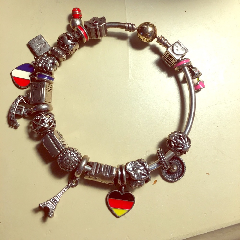 Authentic pandora bracelet with gold clasp