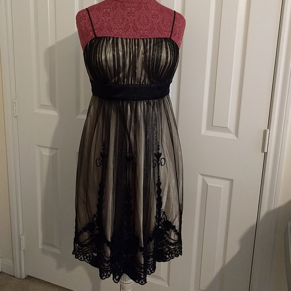 Spaghetti strap black over cream dress