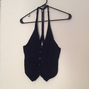 Vest with faux leather straps