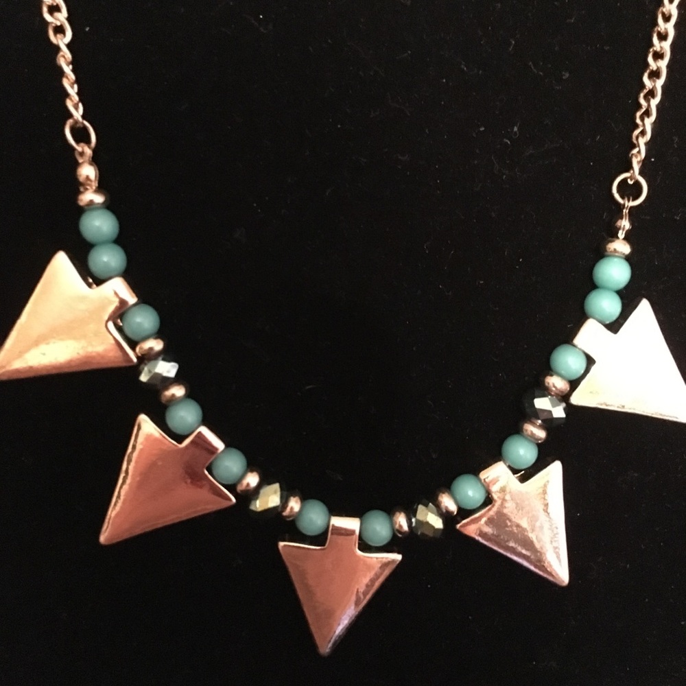 turquoise stones and gold  on a gold chain