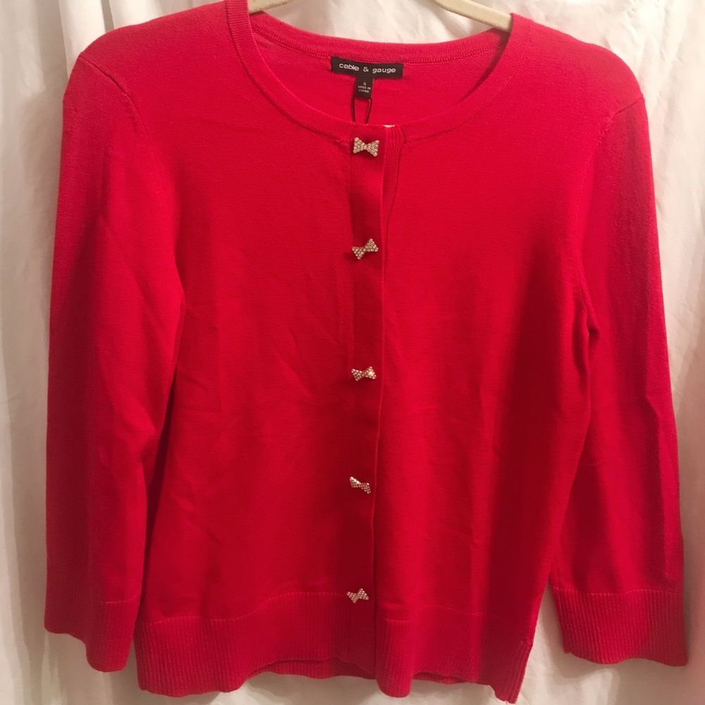 Red holiday sweater with cute bow buttons