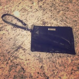 Like new Cole Haan wristlet clutch in black