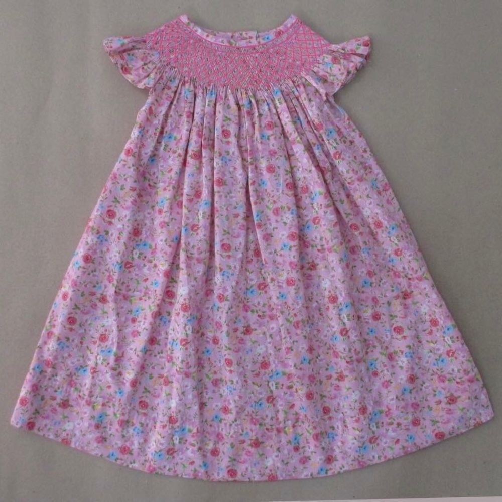 Pink floral smocked bishop dress