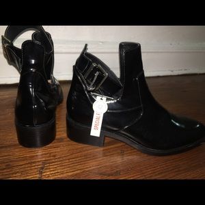 Ankle boots with strap