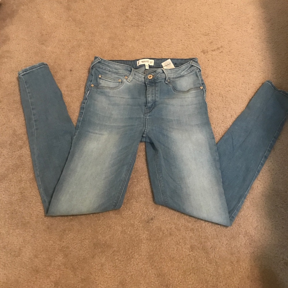 Light wash jeans from Mango