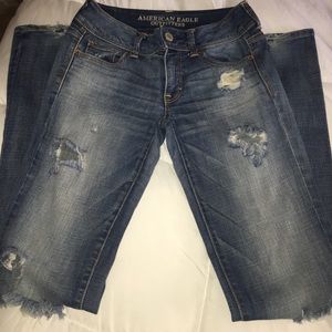 Women's destroyed kick boot super stretch jeans